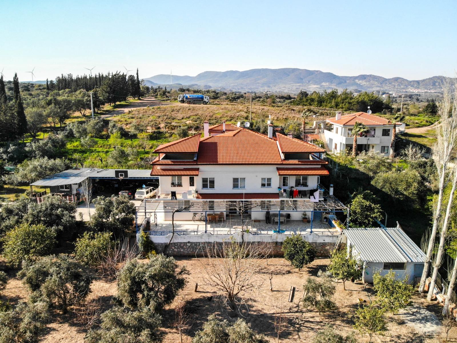 DATÇA'DA İÇİNDE APARTMAAN BULUNAN ARAZİ